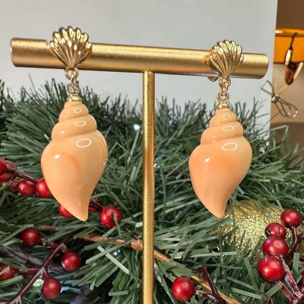 Conch stud earrings